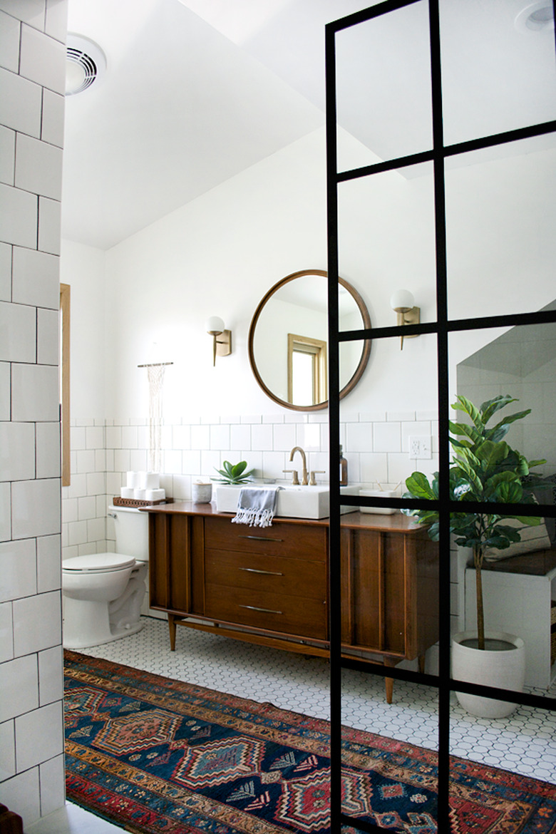 bathroom mirror idea with midcentury bathroom with wooden mirror, persian rug and crittall shower screen