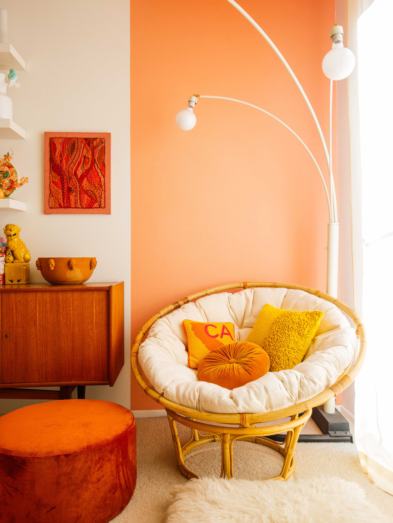 Red, orange, and yellow tertiary colors in a reading nook