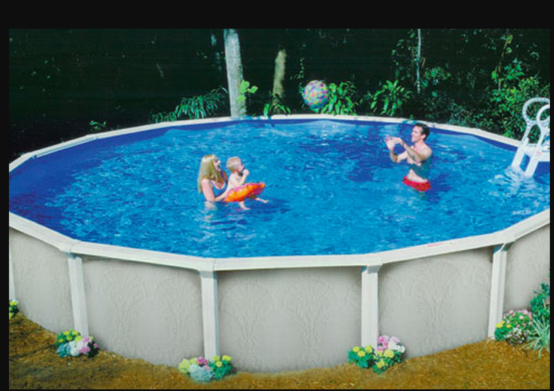 Family enjoying an above-ground swimming pool.