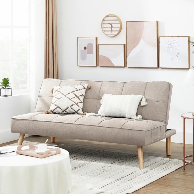 tan sofa with wood legs