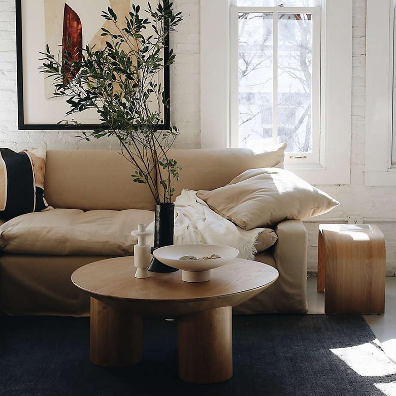 seating area with couch and round table