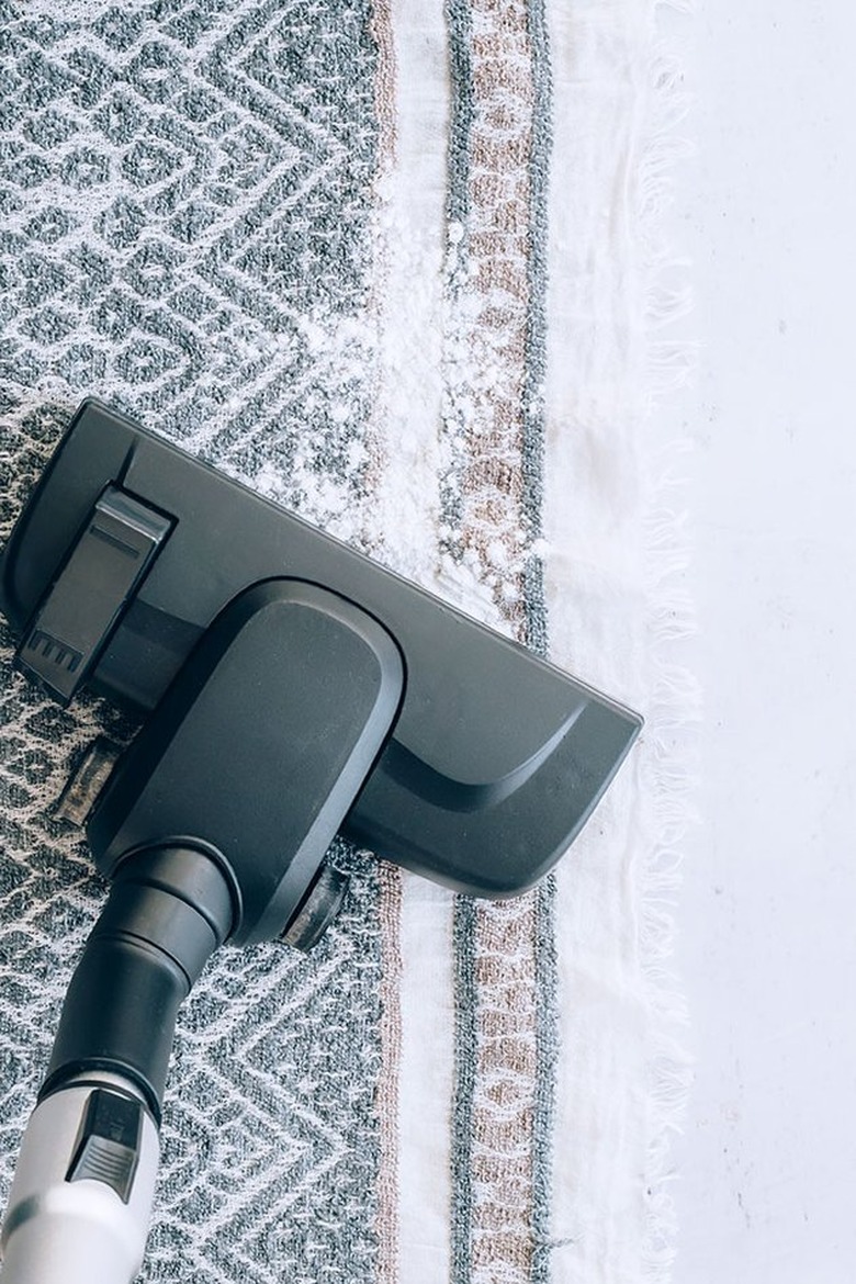 Vacuum cleaning carpet