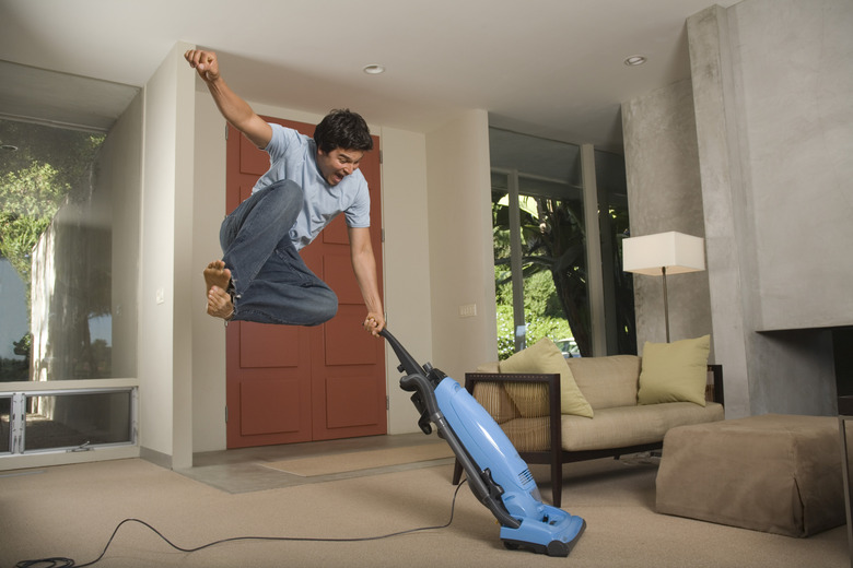 Man vacuuming