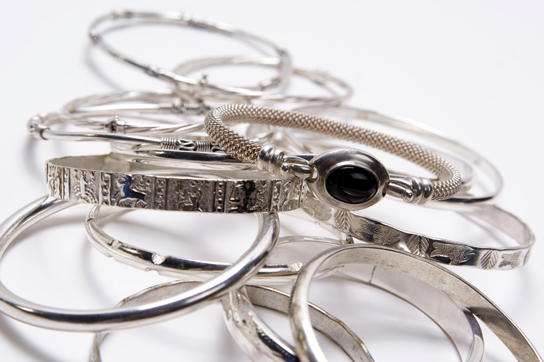 Silver bangles.