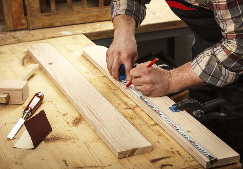 Carpenter working with tools.