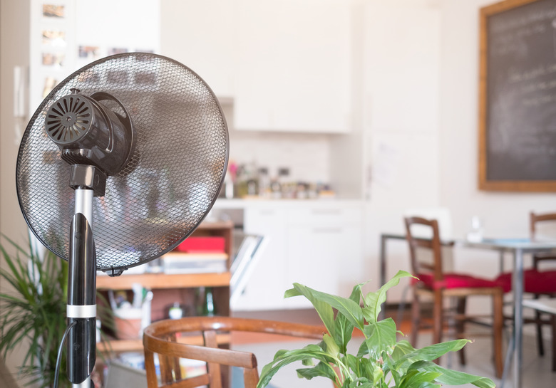 Cooling fan refreshing home room for summer