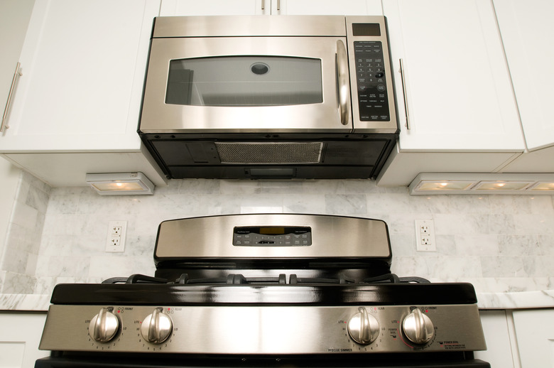 Steel oven with microwave in kitchen