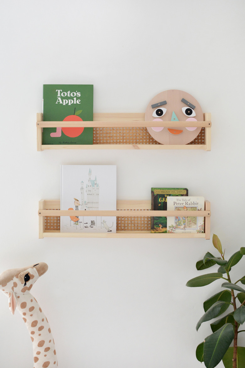 IKEA Flisat shelves with cane book holders