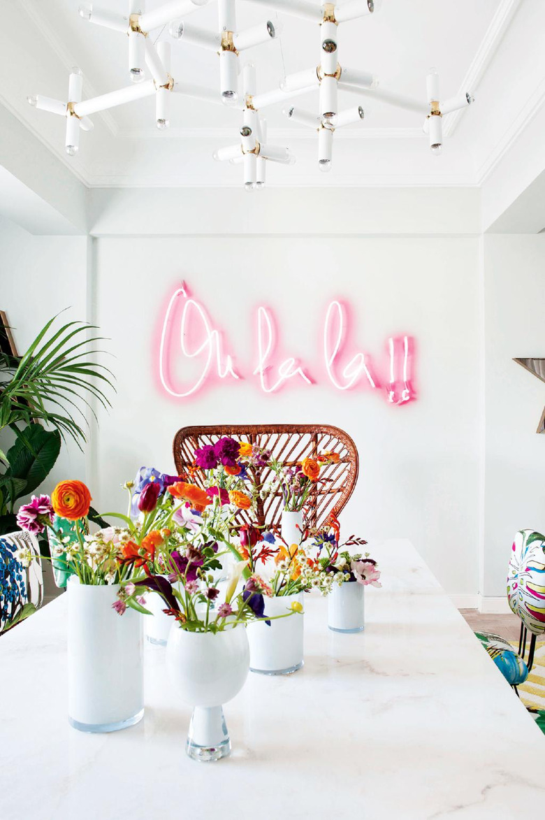 neon sign in bohemian dining room