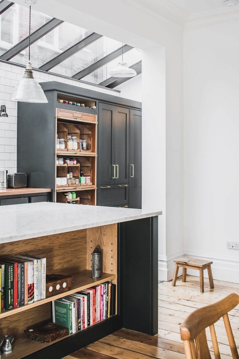 Kitchen island storage for books with white countertop