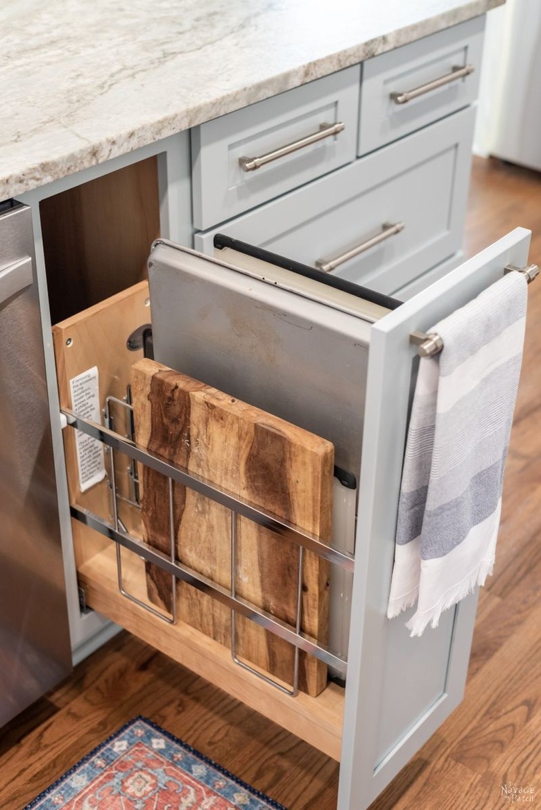 pull out cabinet in light blue kitchen island