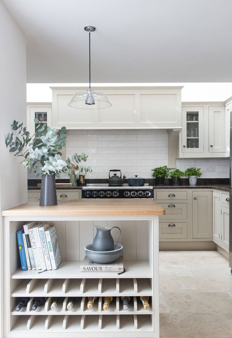 Kitchen island storage for wine with wood countertop