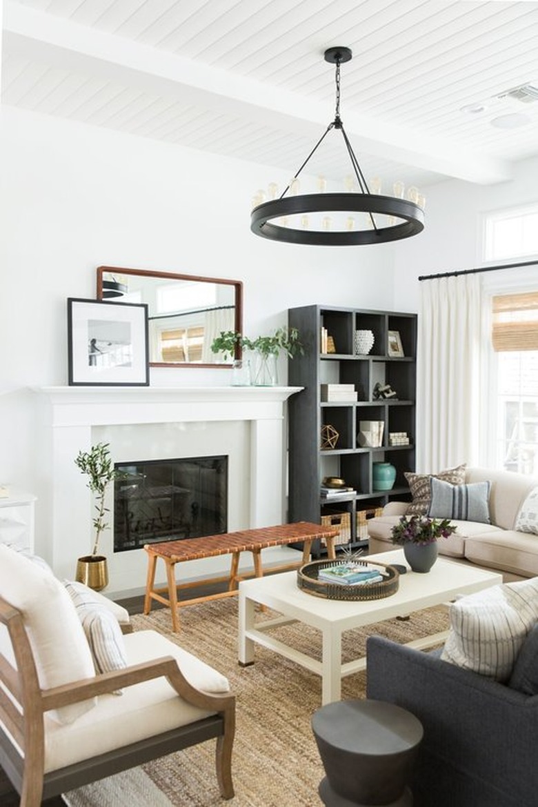 Living room shelving idea near fireplace and sofas