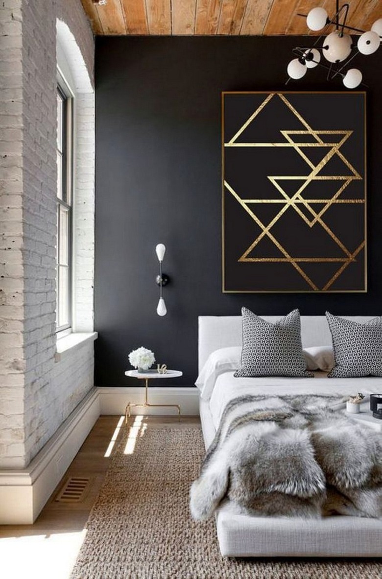 Bedroom with wooden ceiling and black wall