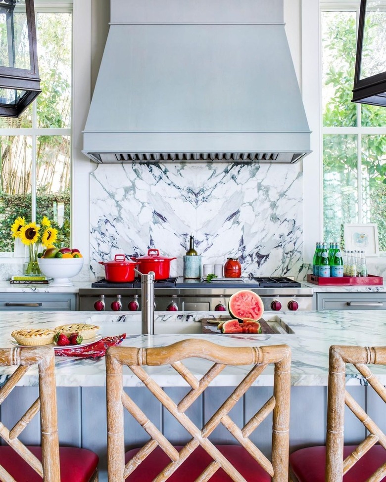 light blue kitchen with red accents