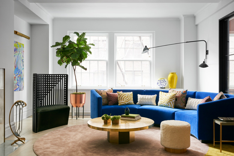 modern living room with blue sofa