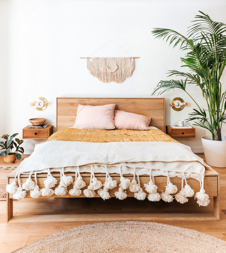 minimalist bedroom with pops of pink