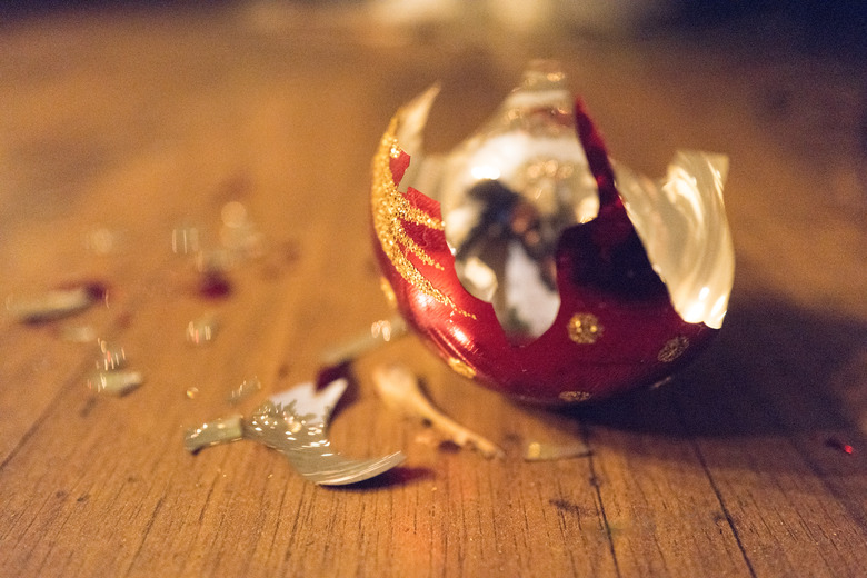 Broken Christmas bauble on floor