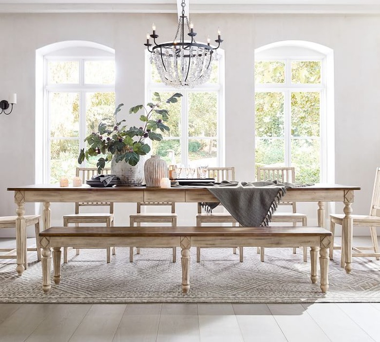 white traditional dining room with wooden table