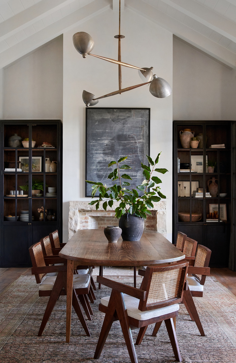 beige and black traditional dining room with large table