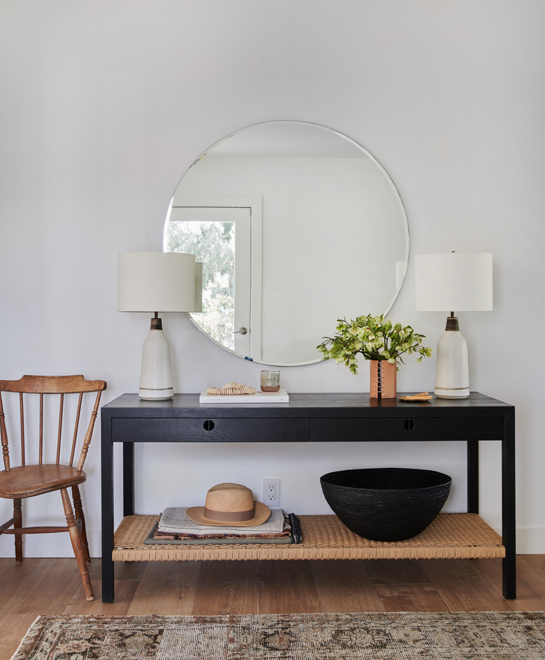 traditional entryway table with woven shelf and drawer for storage