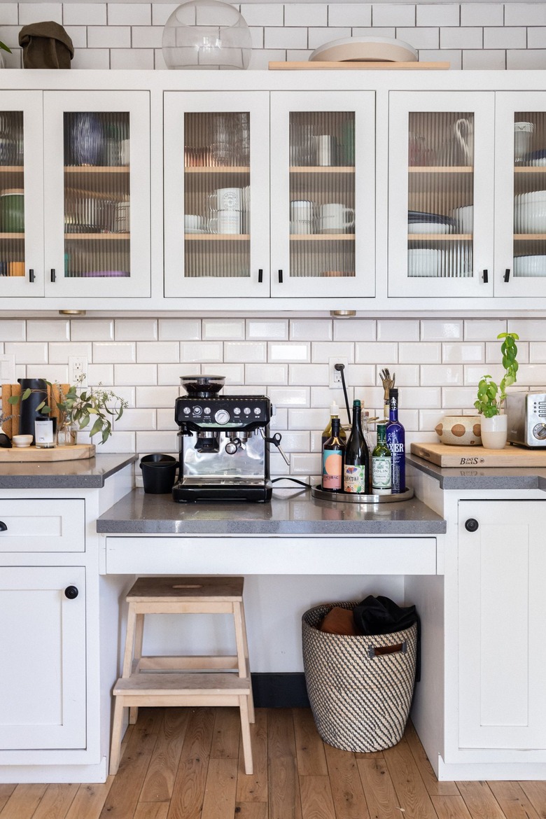 traditional kitchen with glass door cabinets