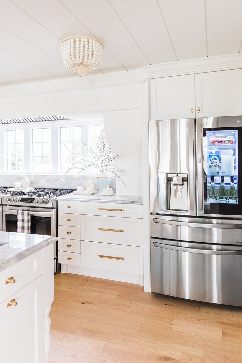 white coastal traditional kitchen with beaded flush light