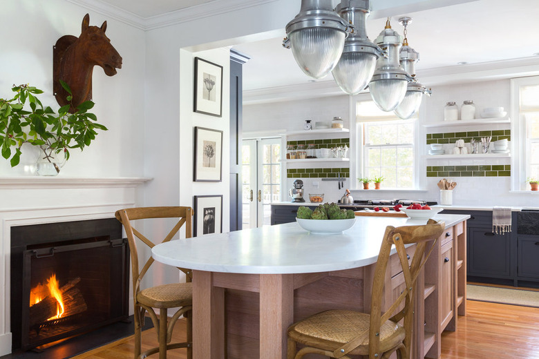 Pink traditional kitchen island with marble top