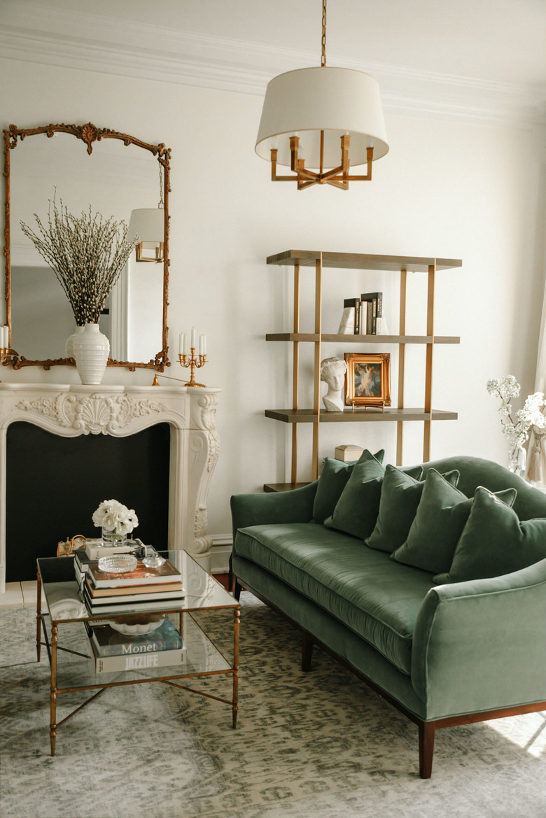 camelback traditional sofa style in green velvet in living room