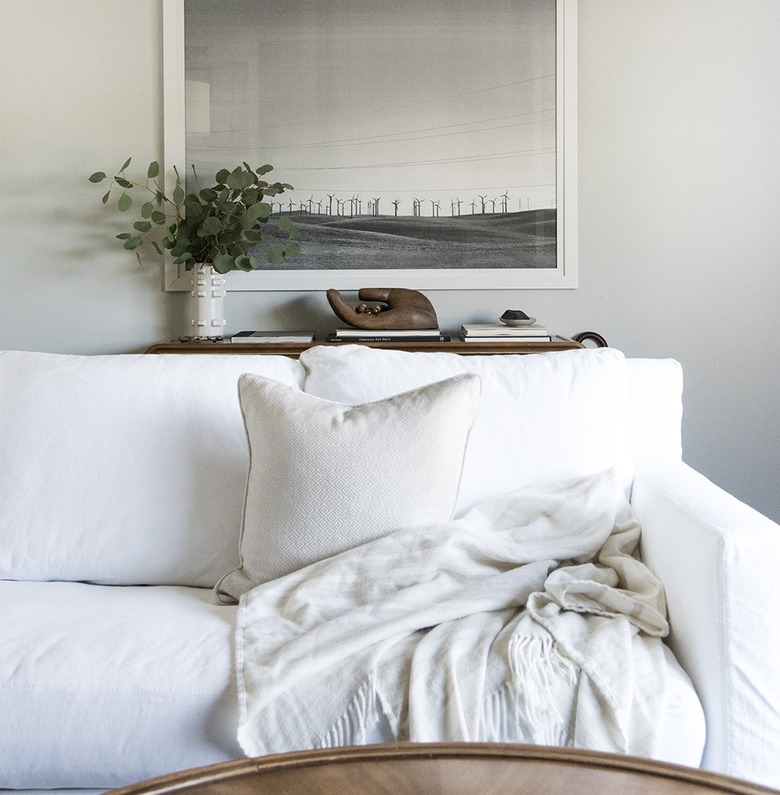 Slipcovered sofa in white modern living room