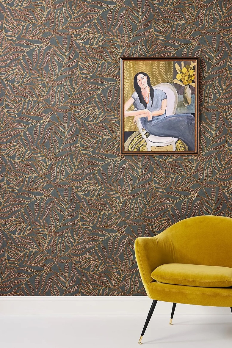 Leaf wallpaper with velvet chair