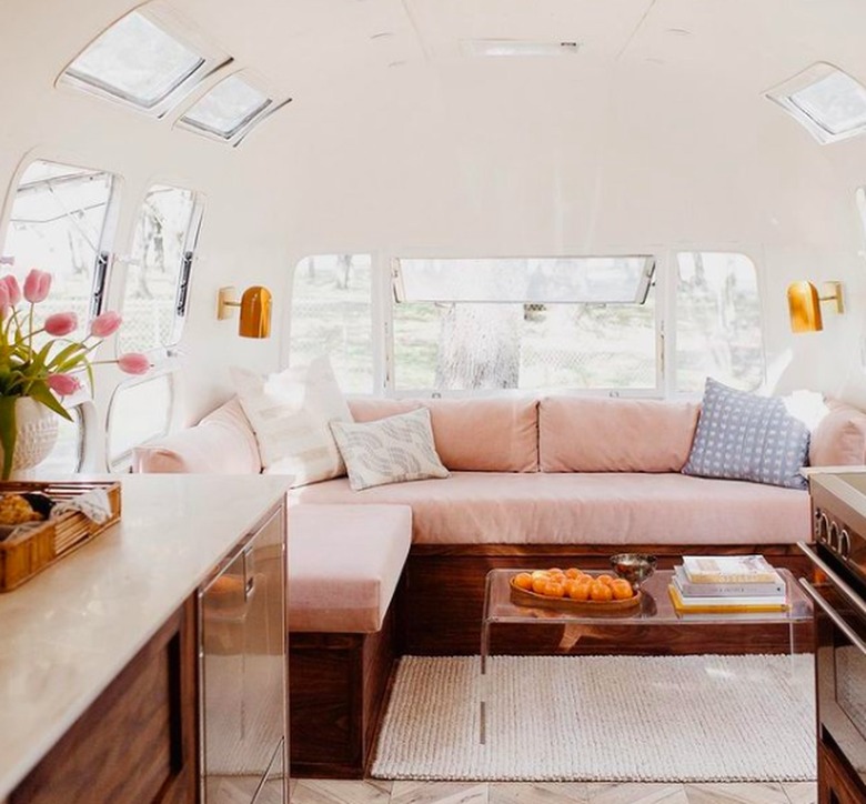 interior of modern airstream and pink couch