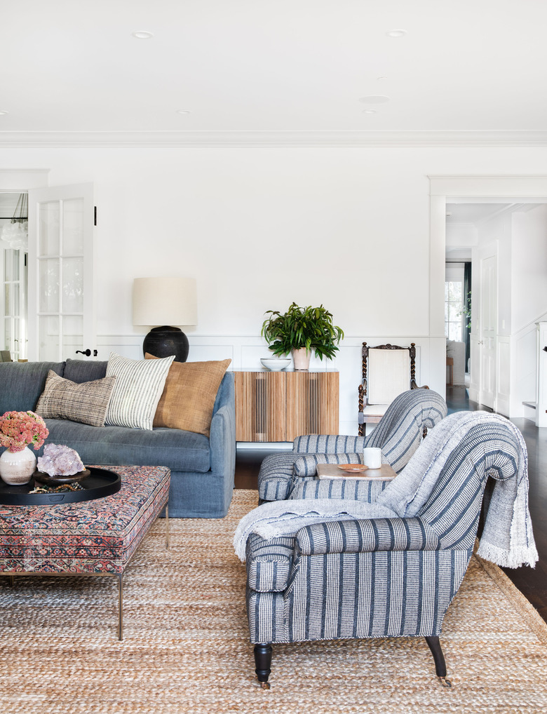 farmhouse style living room with indigo patterns and jute rug