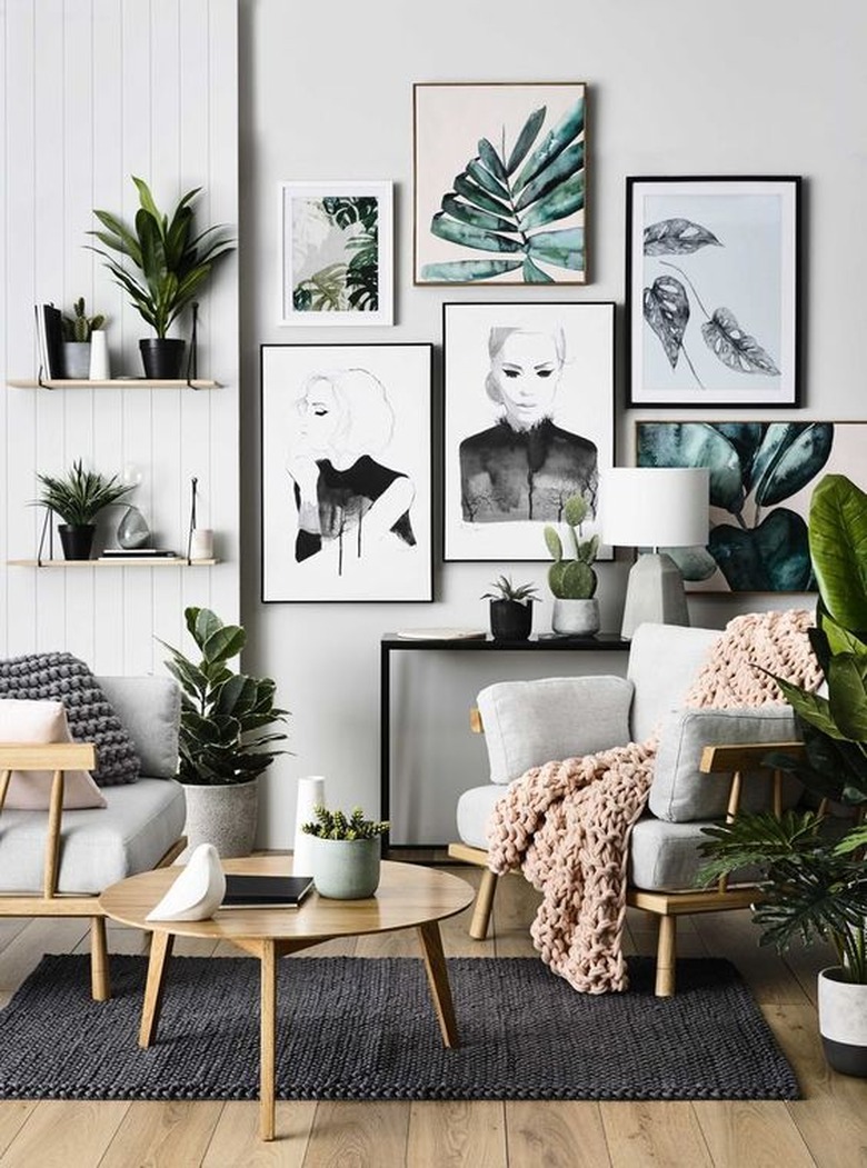 tropical living room with botanical artwork