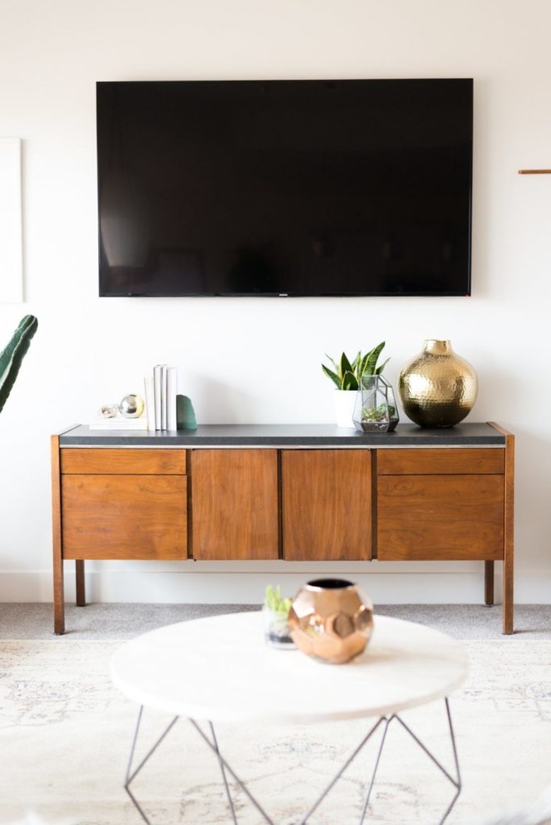 Living room storage ideas with vintage credenza