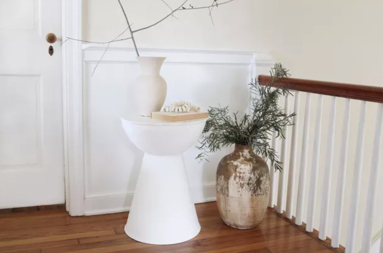 Plaster coated end table. Large floor vase.