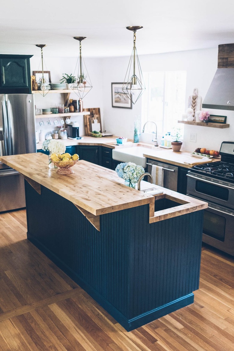 wood and navy blue two-tier island in bohemian kitchen