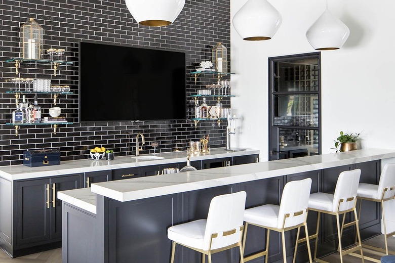 two tier kitchen island in navy blue with marble countertop