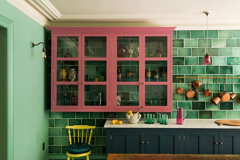 dark green and pink two-tone kitchen