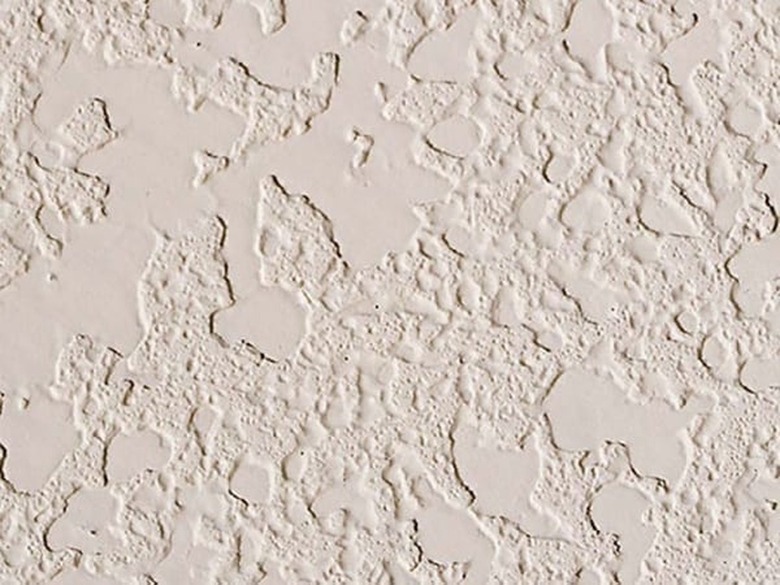 A close-up of knockdown ceiling texture