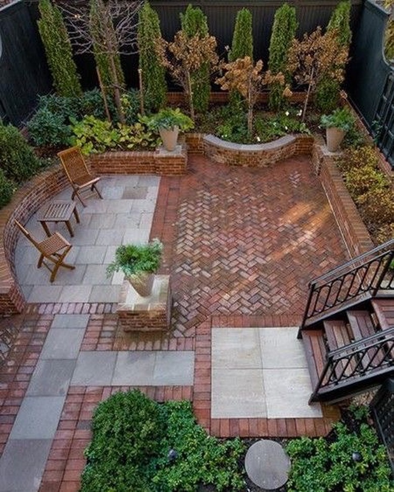 hardscape materials herringbone brick patio with stone tiling