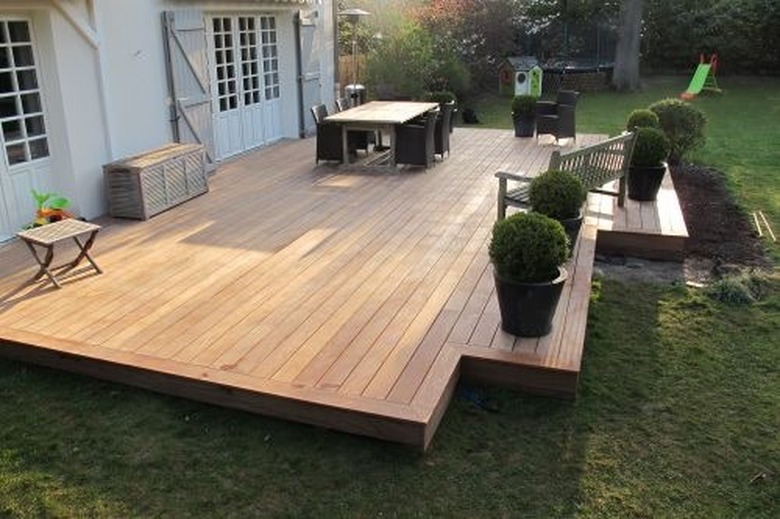 wood hardscape materials backyard with wooden deck