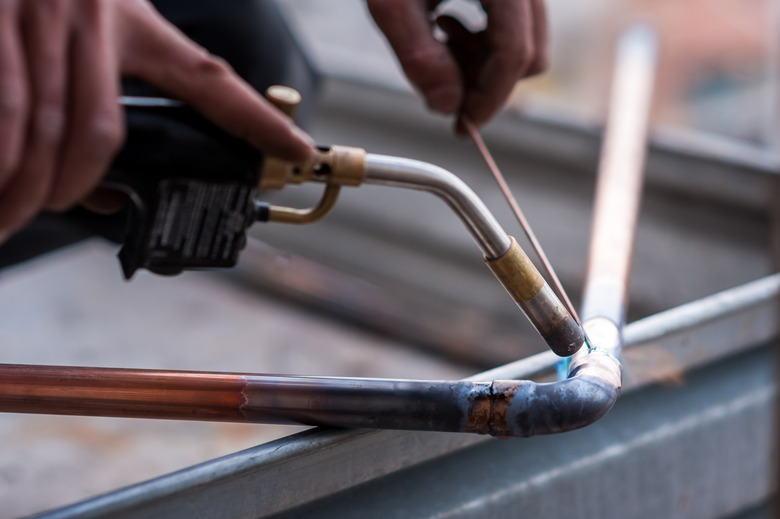 Welding of copper pipe.