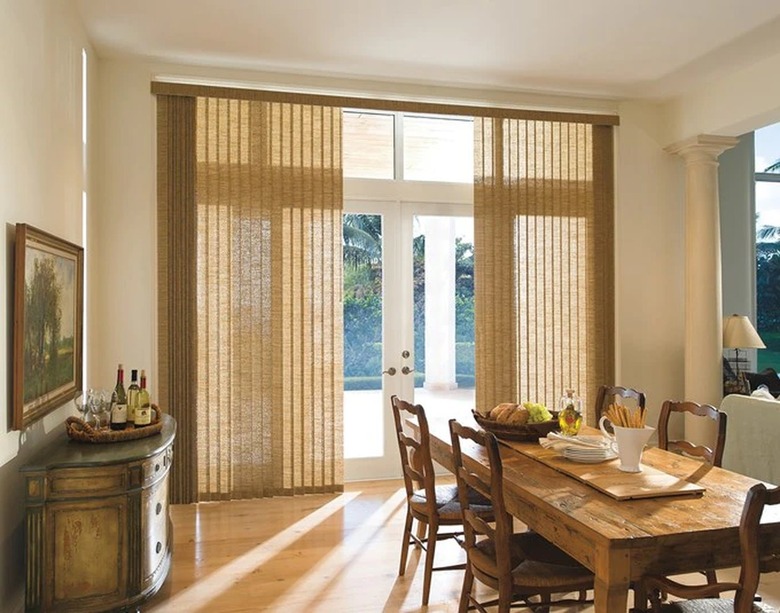 Fabric vertical blinds in a dining room