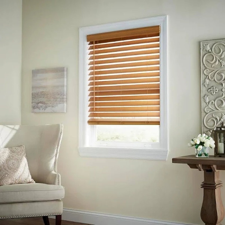 Wood blinds hung in a living room