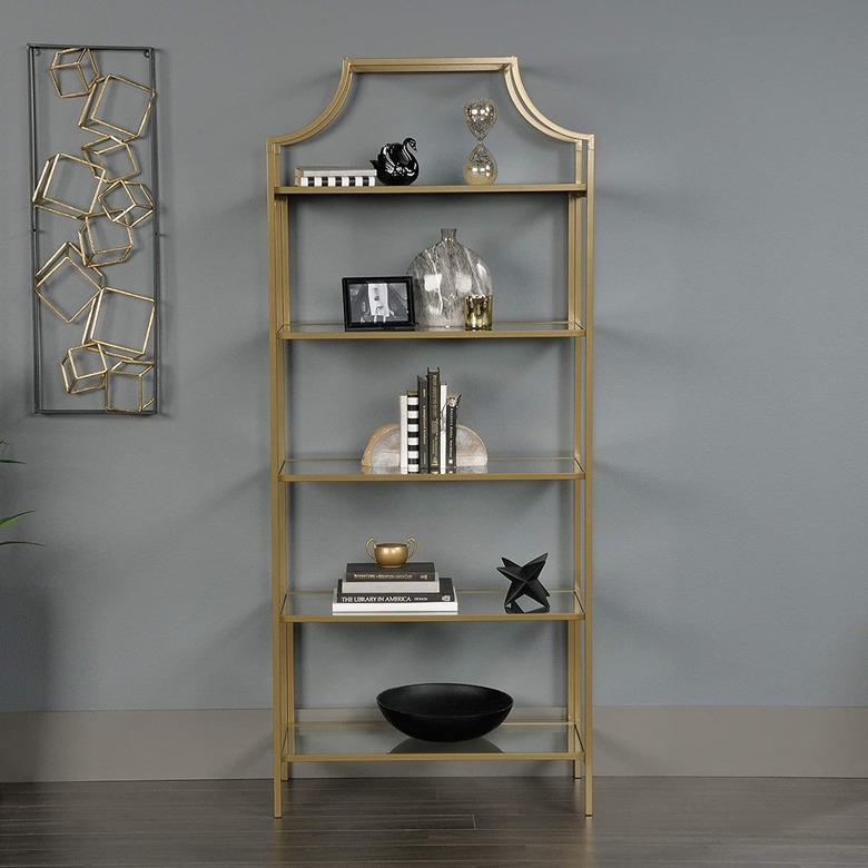 brass sleek bookshelf with black accents