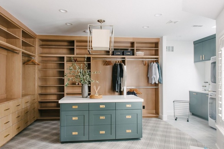 walk-in oak closet and laundry room