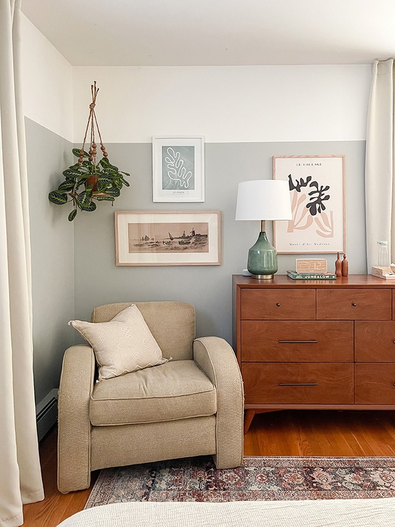 room with dark brown floors and light gray walls