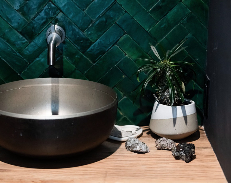 Round metal bowl sink, dark green tile backsplash and Wall-Mounted Bathroom Faucet