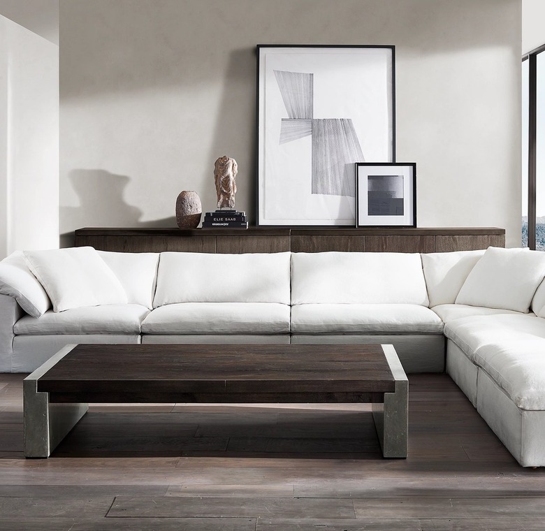 white fluffy sectional in minimalist living room